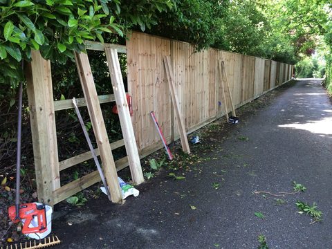 Woodland Closeboard fence install with wooden posts